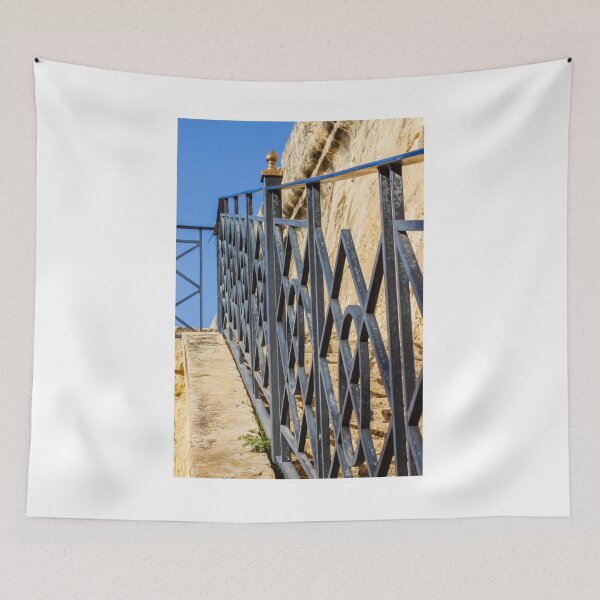 Item preview, Wrought Iron Railing on Stone Staircase With Geometric Pattern Against Blue Sky designed and sold by Nmallia.