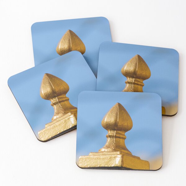 Item preview, Golden Finial Fence Post Close-Up Against Blue Sky – Gilded Decorative Metal Railing Detail designed and sold by Nmallia.