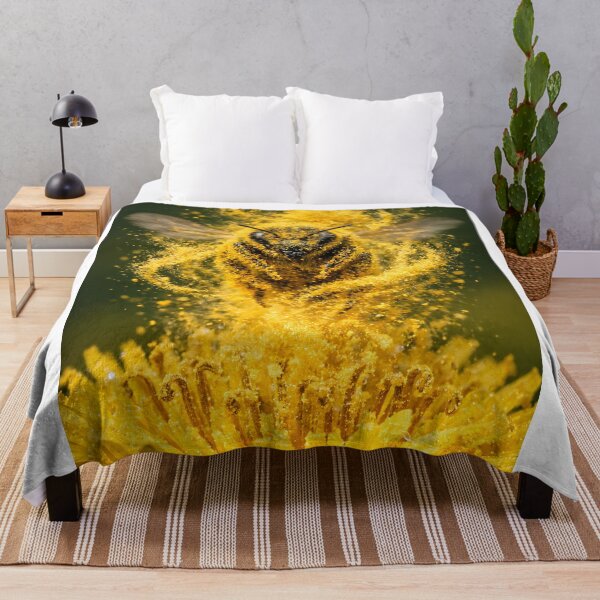 Item preview, Bee in flight with a golden pollen cloud on a dandelion designed and sold by Fotografin1981.