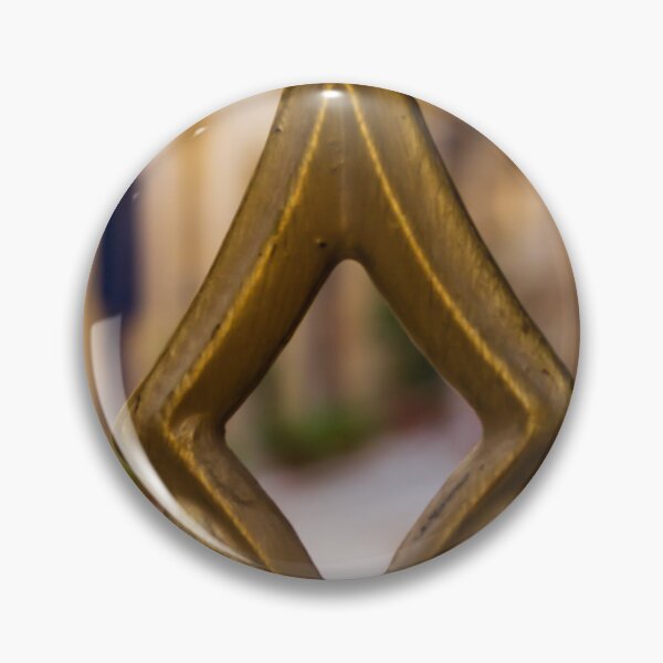Item preview, Brass Finial Close-Up on Ornate Fence With Shallow Street Bokeh and Warm Mediterranean Tones designed and sold by Nmallia.