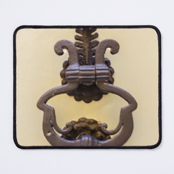 Item preview, Antique Iron Door Knocker On Pale Wooden Door With Ornate Vintage Design And Patina designed and sold by Nmallia.