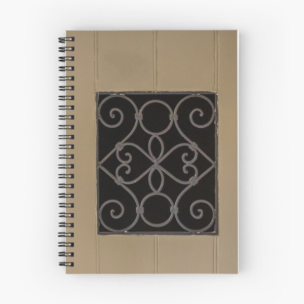 Item preview, Decorative Metal Grille Vent On Beige Wooden Panel Interior Wall Detail With Ornate Scrollwork designed and sold by Nmallia.
