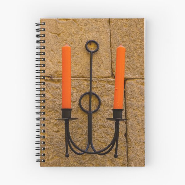 Item preview, Orange Candle Sconce On Stone Wall — Rustic Iron Holder With Twin Candles And Warm Texture designed and sold by Nmallia.