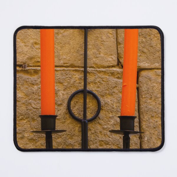 Item preview, Orange Candle Sconce On Stone Wall — Rustic Iron Holder With Twin Candles And Warm Texture designed and sold by Nmallia.