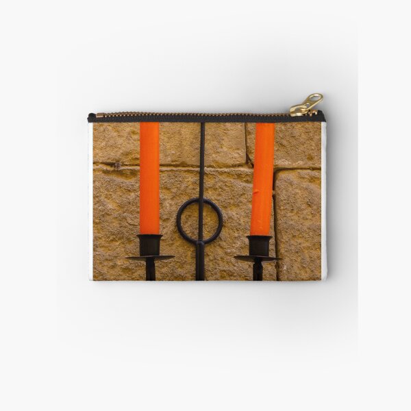 Item preview, Orange Candle Sconce On Stone Wall — Rustic Iron Holder With Twin Candles And Warm Texture designed and sold by Nmallia.