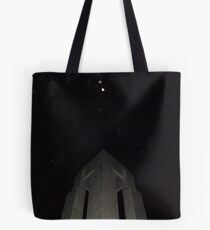 the moon overlooks the monument Tote Bag