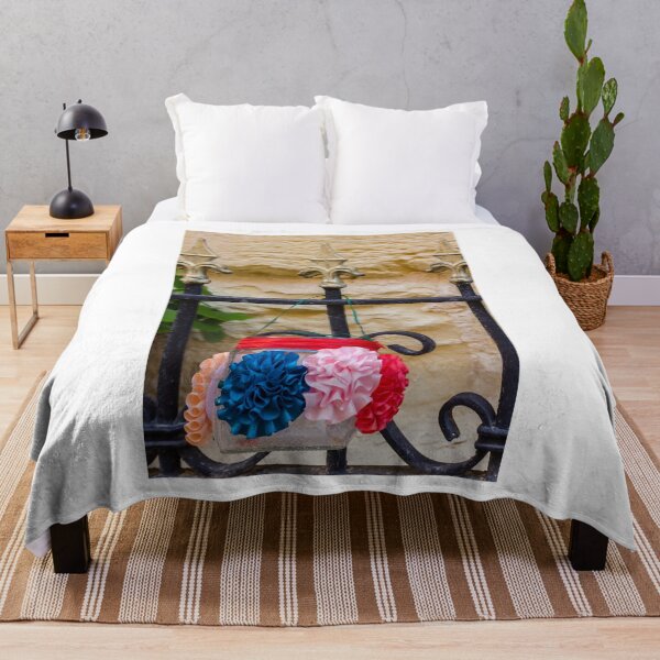 Item preview, Decorative Hanging Jar With Fabric Flowers on Iron Fence Near Stone Wall designed and sold by Nmallia.