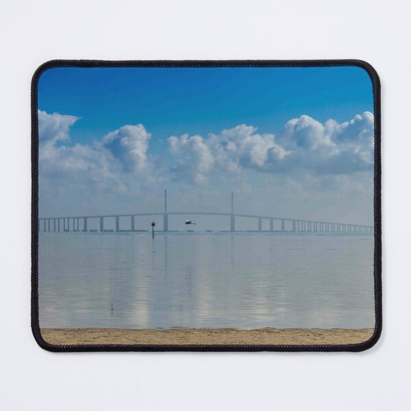 Item preview, The Sunshine Skyway Bridge stretches across Tampa Bay beneath a dramatic blanket of clouds designed and sold by EyezWatchin.