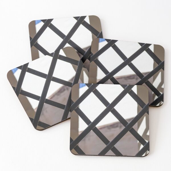 Item preview, Black Metal Lattice Fence With Diamond Pattern Framing Bright Urban Building And Blue Sky Background designed and sold by Nmallia.