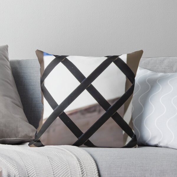 Item preview, Black Metal Lattice Fence With Diamond Pattern Framing Bright Urban Building And Blue Sky Background designed and sold by Nmallia.