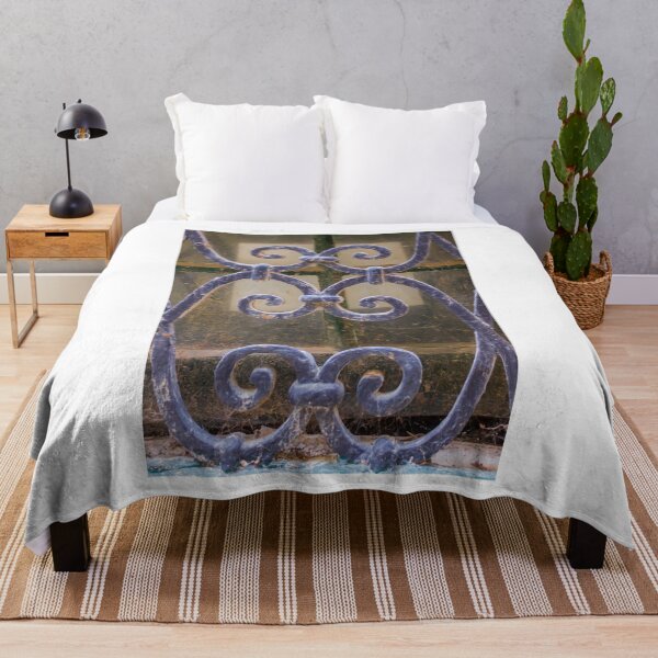 Item preview, Wrought Iron Window Grill With Ornate Scrollwork And Weathered Blue Paint Close-Up designed and sold by Nmallia.