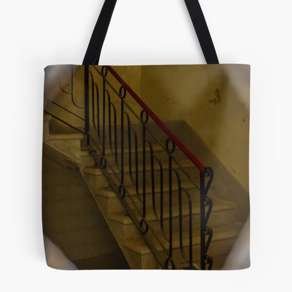 Item preview, Moody Vintage Staircase With Red Handrail and Ornate Iron Railing in Abandoned Interior designed and sold by Nmallia.
