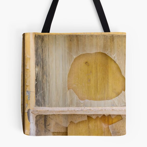 Item preview, Broken Window With Cracked Glass and Peeling Yellow Frame Over Boarded Wood Panel designed and sold by Nmallia.