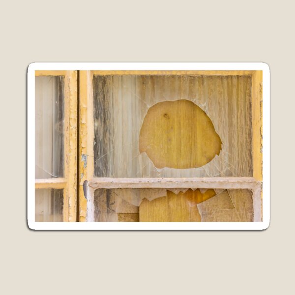 Item preview, Broken Window With Cracked Glass and Peeling Yellow Frame Over Boarded Wood Panel designed and sold by Nmallia.