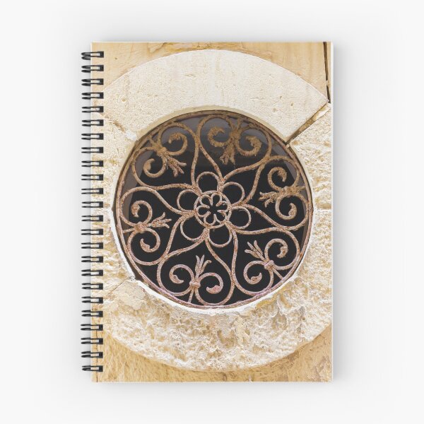 Item preview, Ornamental Round Window With Wrought Iron Grille Set In A Weathered Stone Wall designed and sold by Nmallia.