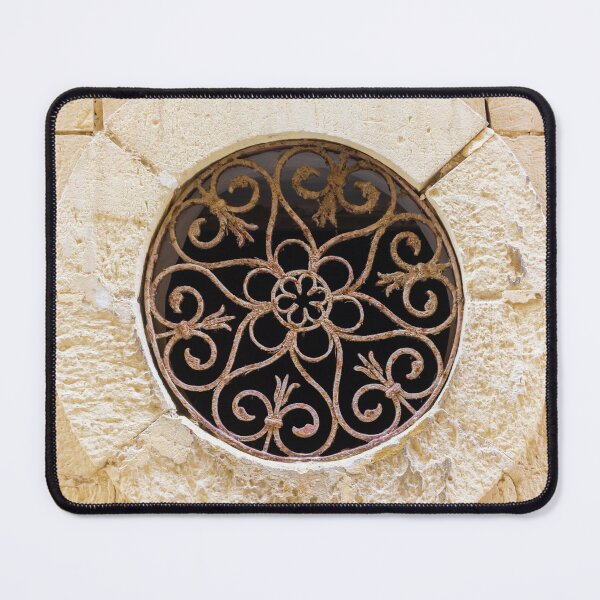 Item preview, Ornamental Round Window With Wrought Iron Grille Set In A Weathered Stone Wall designed and sold by Nmallia.