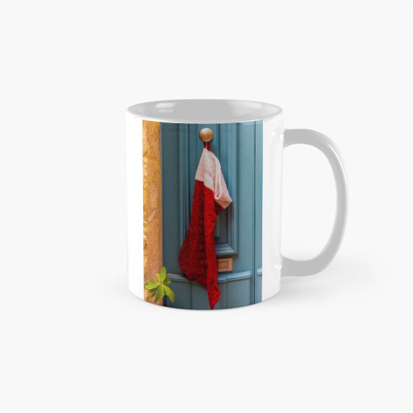 Item preview, Red Christmas Stocking Hanging On Blue Door Knob At Stone Entrance, Festive Holiday Decoration designed and sold by Nmallia.