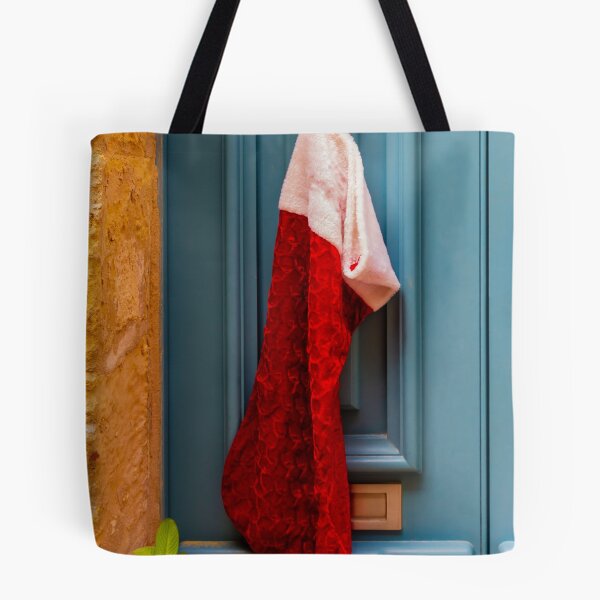 Item preview, Red Christmas Stocking Hanging On Blue Door Knob At Stone Entrance, Festive Holiday Decoration designed and sold by Nmallia.