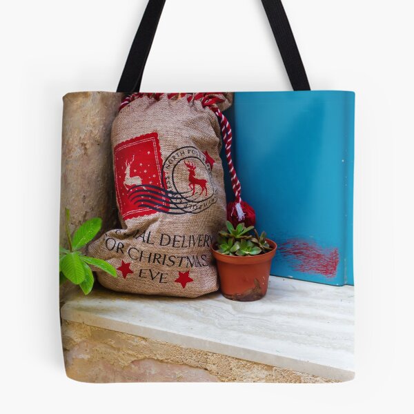 Item preview, Christmas Gift Sack and Potted Succulent At A Blue Doorstep With Rustic Burlap Bag designed and sold by Nmallia.