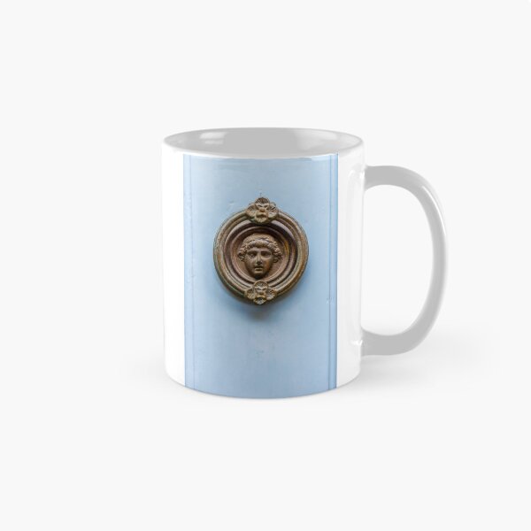 Item preview, Antique Brass Door Knocker With Classical Face On Pale Blue Wooden Door designed and sold by Nmallia.