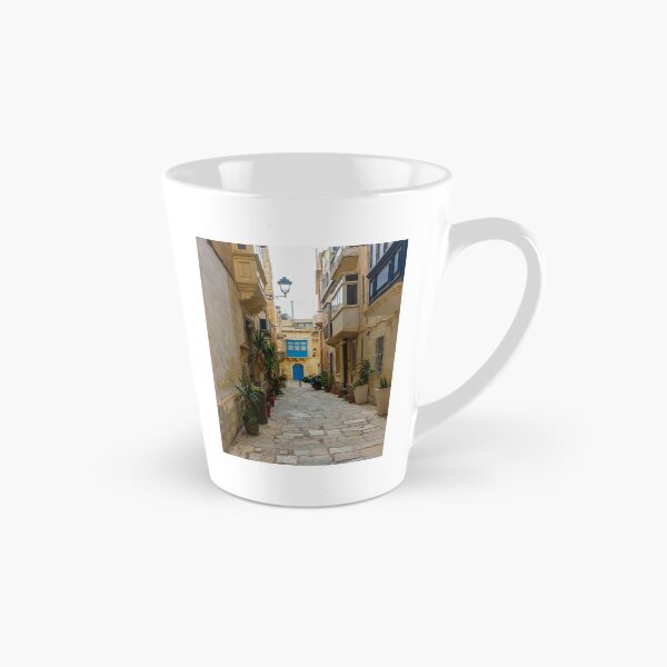 Item preview, Sunlit Narrow Mediterranean Alley With Blue Door, Stone Pavement, Potted Plants And Traditional Balconies designed and sold by Nmallia.