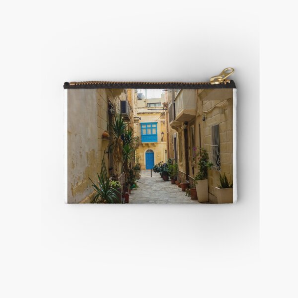 Item preview, Sunlit Narrow Mediterranean Alley With Blue Door, Stone Pavement, Potted Plants And Traditional Balconies designed and sold by Nmallia.