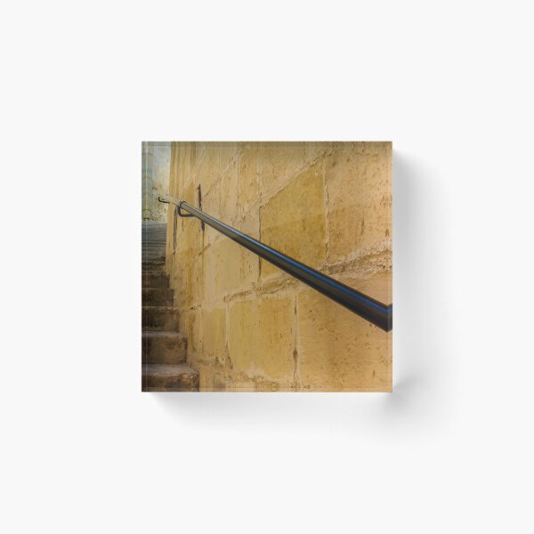 Item preview, Stone Staircase and Black Handrail Along Narrow Ancient Alleyway With Textured Sandstone Walls designed and sold by Nmallia.