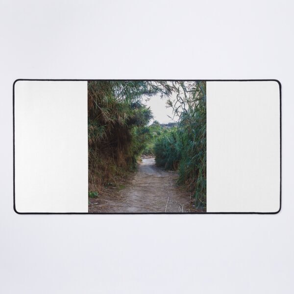 Item preview, Overgrown Reed Pathway Through Lush Vegetation Creating A Secluded Natural Trail And Green Tunnel designed and sold by Nmallia.