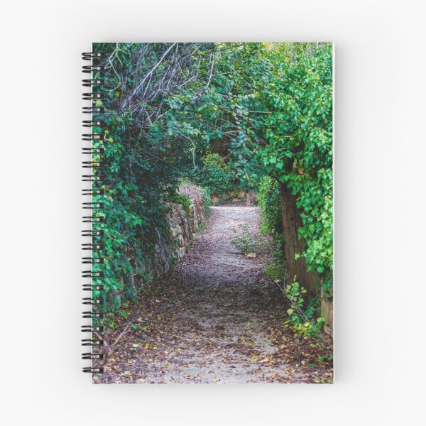 Item preview, Secluded Ivy-Covered Garden Pathway Framed by Stone Walls and Lush Green Archway designed and sold by Nmallia.