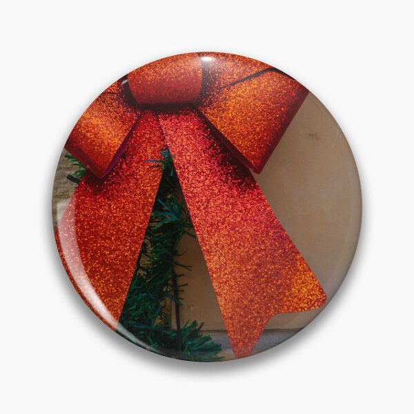 Item preview, Sparkling Red Bow Christmas Decoration On Green Garland Against Stone Wall For Holiday Display designed and sold by Nmallia.