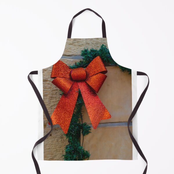 Item preview, Sparkling Red Bow Christmas Decoration On Green Garland Against Stone Wall For Holiday Display designed and sold by Nmallia.