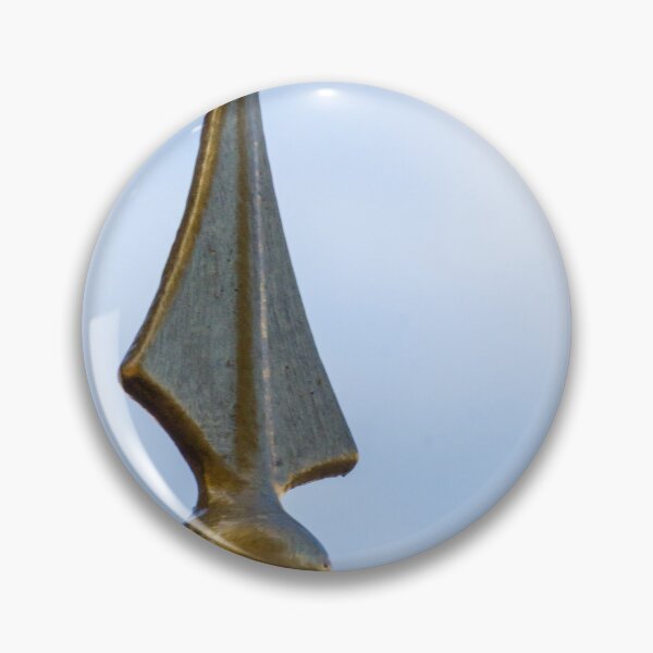 Item preview, Gold Metal Finial Spear Tip On Ornamental Fence Against Blue Sky, Decorative Iron Spike Closeup designed and sold by Nmallia.