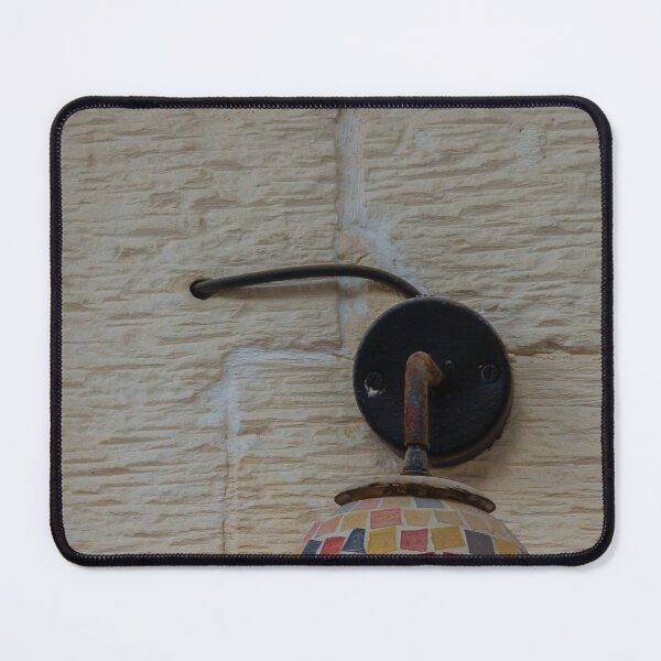 Item preview, Colorful Mosaic Wall Lamp With Warm Glowing Light On Textured Exterior Wall designed and sold by Nmallia.