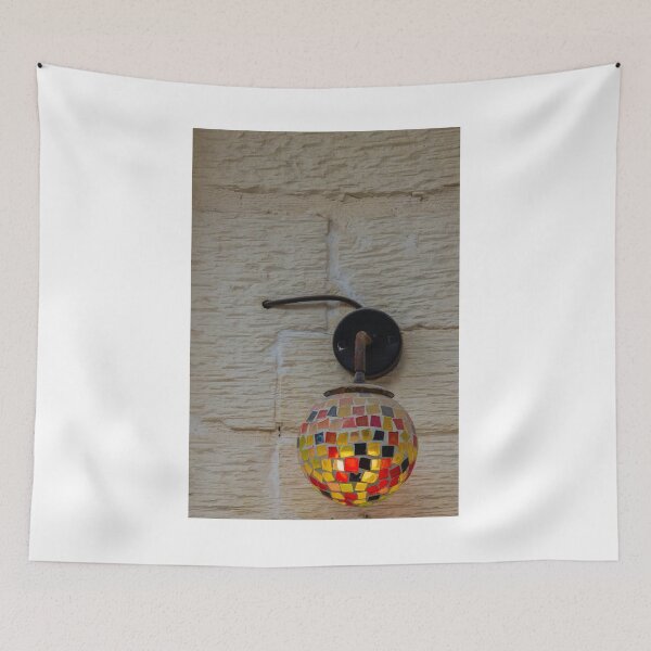 Item preview, Colorful Mosaic Wall Lamp With Warm Glowing Light On Textured Exterior Wall designed and sold by Nmallia.