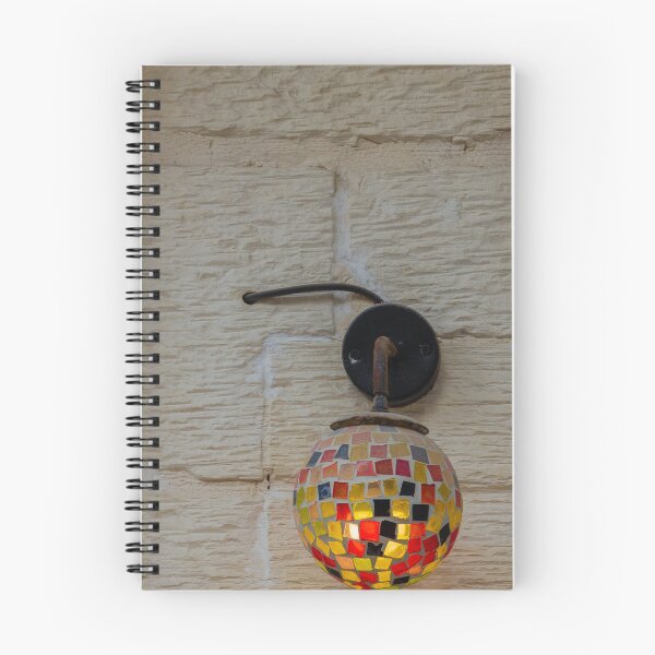 Item preview, Colorful Mosaic Wall Lamp With Warm Glowing Light On Textured Exterior Wall designed and sold by Nmallia.