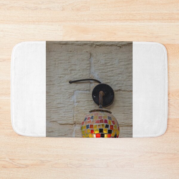 Item preview, Colorful Mosaic Wall Lamp With Warm Glowing Light On Textured Exterior Wall designed and sold by Nmallia.