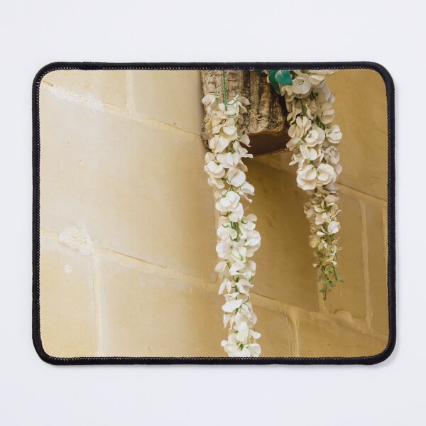 Item preview, Rustic White Floral Garland Hanging From Bark Holder on Stone Wall Interior Decoration designed and sold by Nmallia.