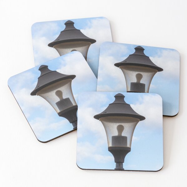 Item preview, Vintage Street Lamp Lantern With Bulb Against Blue Sky And Soft White Clouds designed and sold by Nmallia.