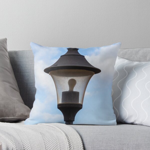 Item preview, Vintage Street Lamp Lantern With Bulb Against Blue Sky And Soft White Clouds designed and sold by Nmallia.