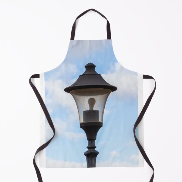 Item preview, Vintage Street Lamp Lantern With Bulb Against Blue Sky And Soft White Clouds designed and sold by Nmallia.