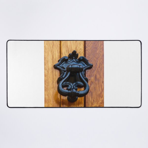 Item preview, Antique Black Metal Door Knocker On Warm Wooden Door Panel With Ornate Decorative Details designed and sold by Nmallia.
