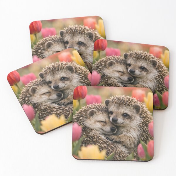 Item preview, Two cuddly hedgehogs in a colorful tulip field in spring designed and sold by Fotografin1981.