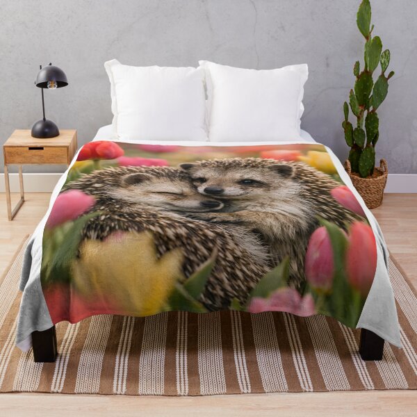 Item preview, Two cuddly hedgehogs in a colorful tulip field in spring designed and sold by Fotografin1981.