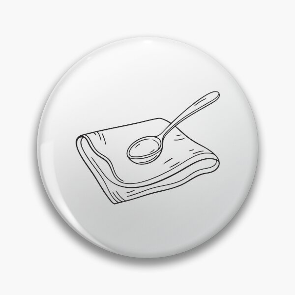 Item preview, A serving spoon placed neatly on a folded cloth napkin designed and sold by rasagamastore.