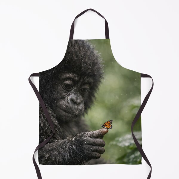 Item preview, A cute baby gorilla looks at a butterfly on its finger designed and sold by Fotografin1981.