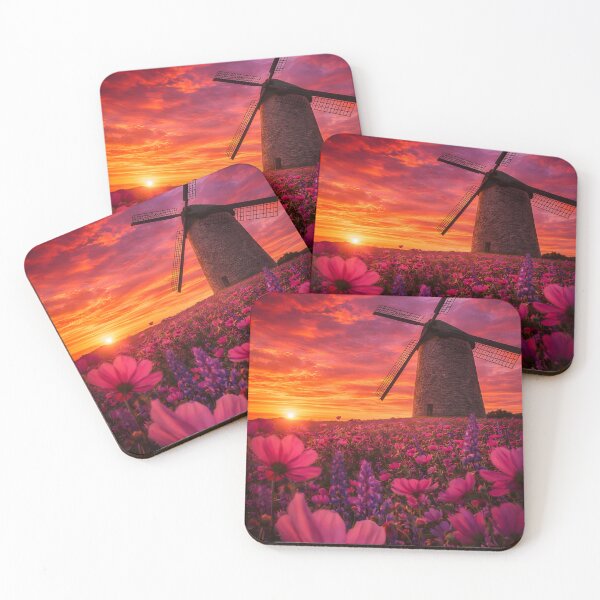 Item preview, Historic windmill in a pink flower field at a fiery sunset designed and sold by Fotografin1981.