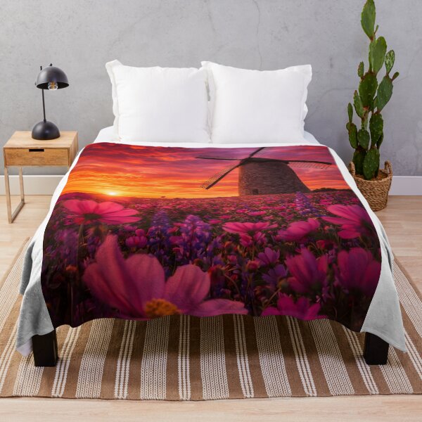 Item preview, Historic windmill in a pink flower field at a fiery sunset designed and sold by Fotografin1981.