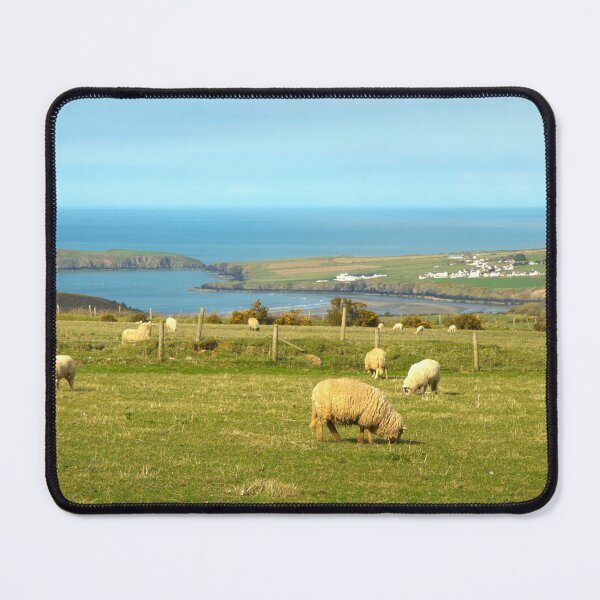 Item preview, sheep grazing green grass under a blue sky designed and sold by lightmonger.