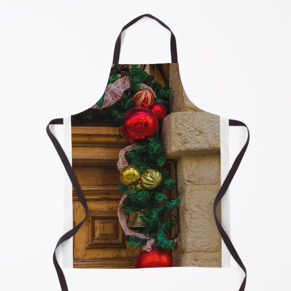 Item preview, Festive Red and Gold Christmas Ornaments and Garland Decorating a Rustic Wooden Doorway for Holiday Cheer designed and sold by Nmallia.