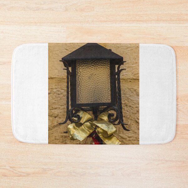 Item preview, Rustic Wrought Iron Lantern Decorated With Gold Bow And Red Ornament On Stone Wall designed and sold by Nmallia.